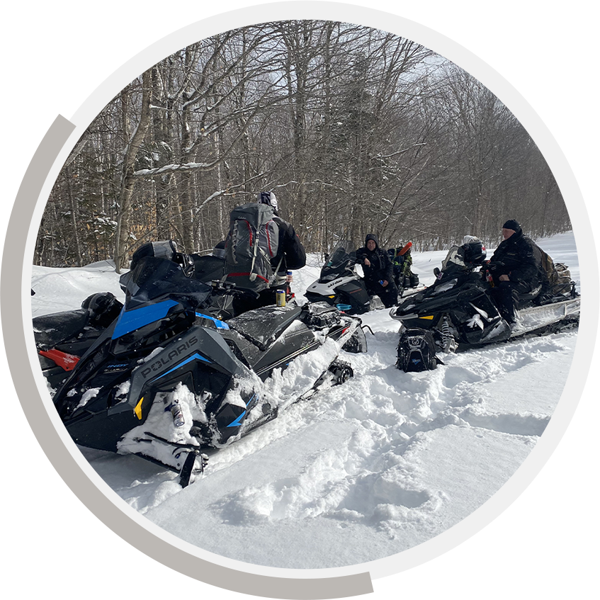 Snowmobilers taking part in Valley Ref Rewards Tobique River Escape